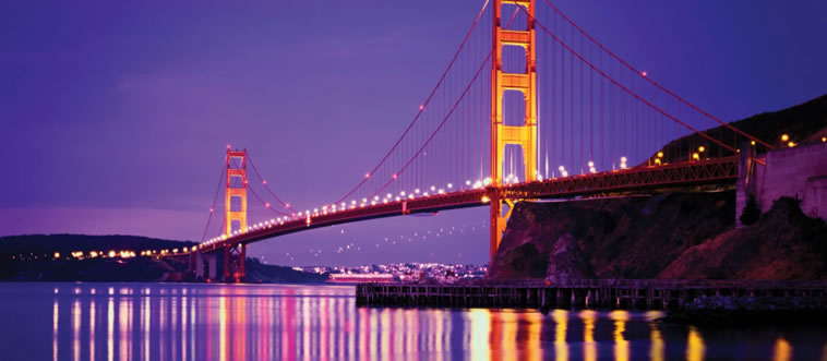 Can you spot the classic West Coast destination where the bright orange spans of the Golden Gate Bridge meet the bay?