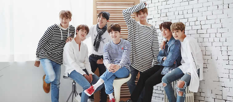 Let's kick things off with a sweet, simple one: which of the guys holds the title of BTS's beloved 'maknae'?