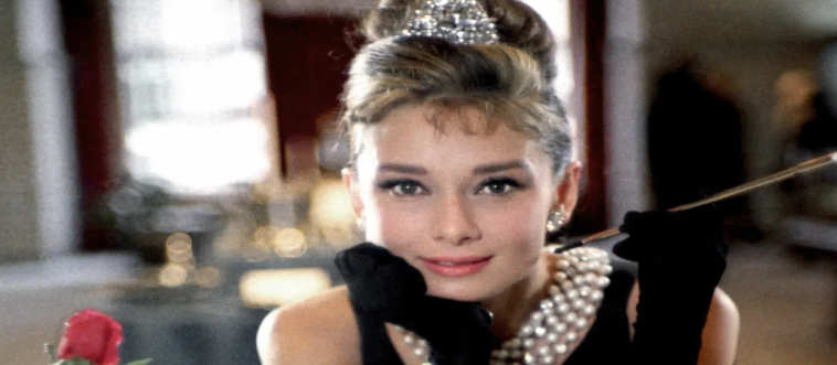 Who is the legendary actress who slipped into the elegant black dress of Holly Golightly for Breakfast at Tiffany’s?