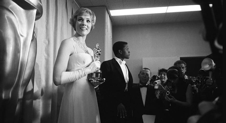 Let's kick things off with a golden note: which spectacular movie earned the brilliant English actress Julie Andrews her very first Academy Award?